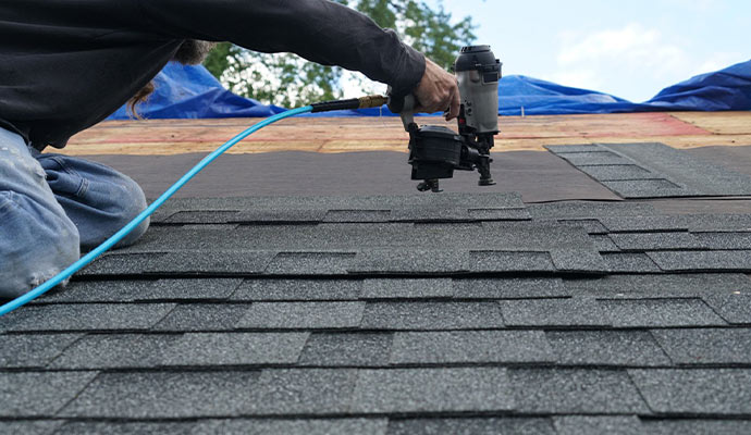 Workers are installing roof